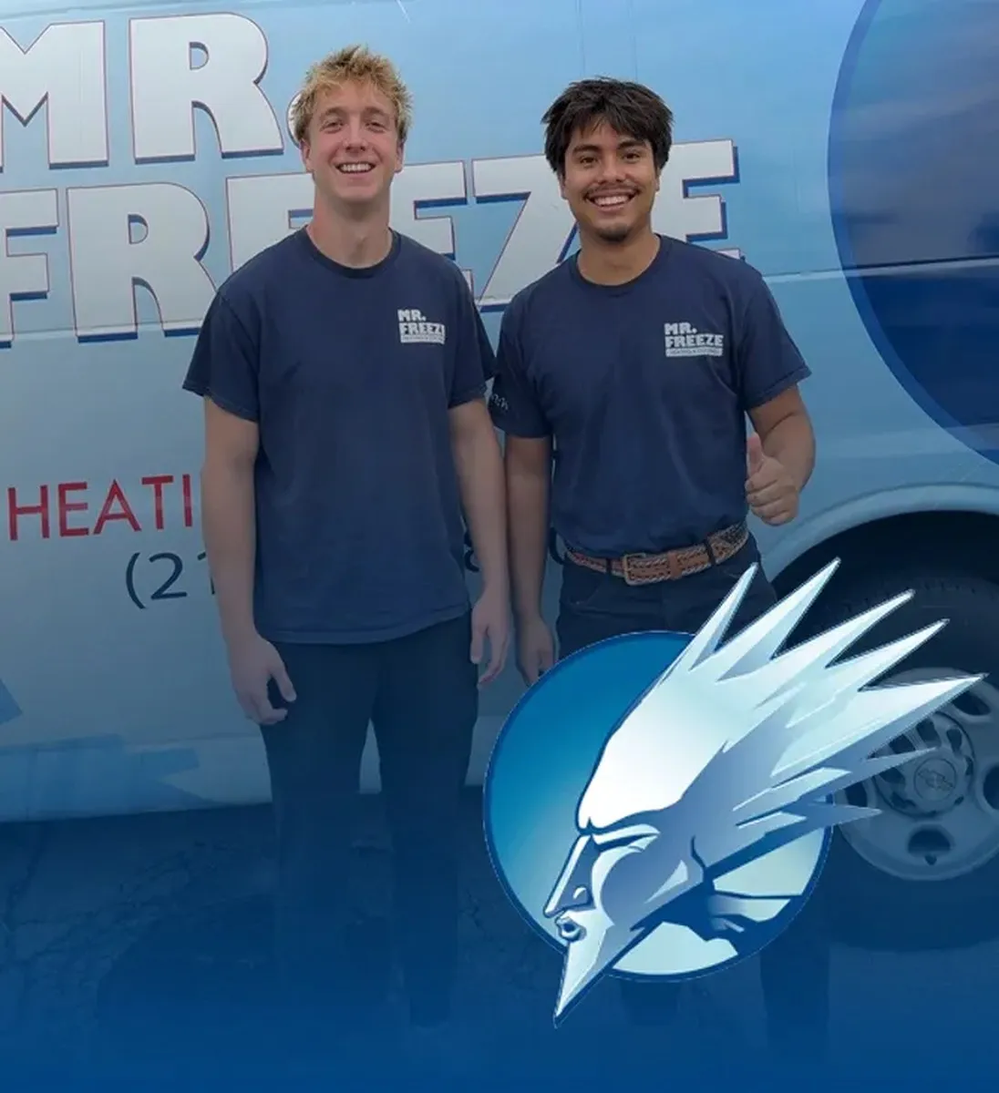 Two Mr. Freeze team members in branded shirts standing beside their service van